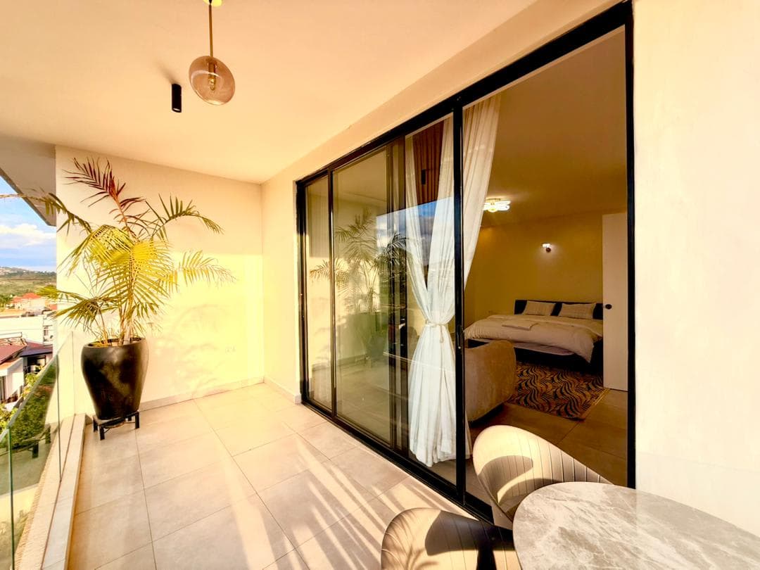 Private balcony overlooking Kigali hills